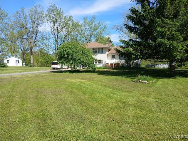 7974 Tonawanda Creek Rd, Royalton, NY 14094 - view of green lawn with driveway