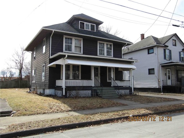 traditional style home featuring a porch