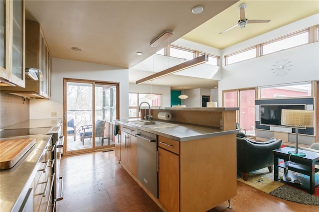 kitchen with a center island with sink, dishwasher, stainless steel countertops, glass insert cabinets, and a sink