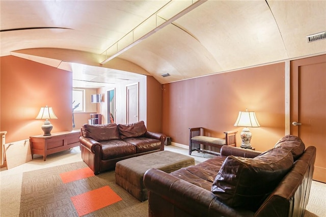 carpeted living area with vaulted ceiling, visible vents, and baseboards