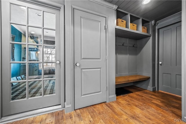 mudroom with wood finished floors