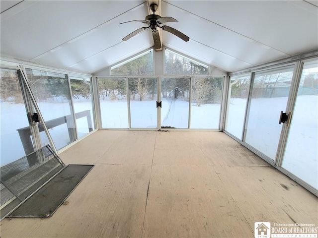 unfurnished sunroom with ceiling fan and lofted ceiling with beams