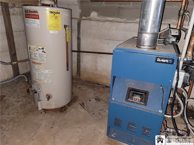 utility room featuring gas water heater and a heating unit