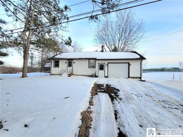 view of front of home featuring a garage