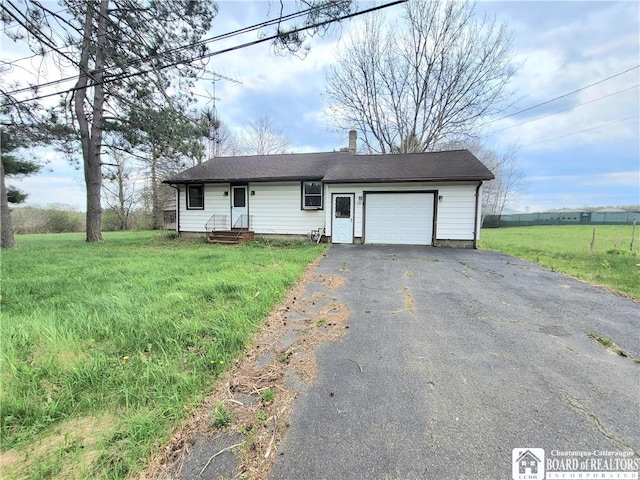 5185 Rte 474, Harmony, NY 14710 - single story home featuring an attached garage, a front yard, driveway, and a chimney