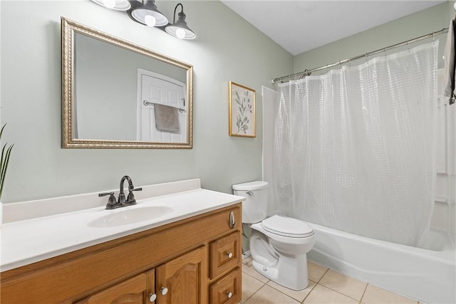 bathroom with toilet, tile patterned flooring, shower / bath combo with shower curtain, and vanity