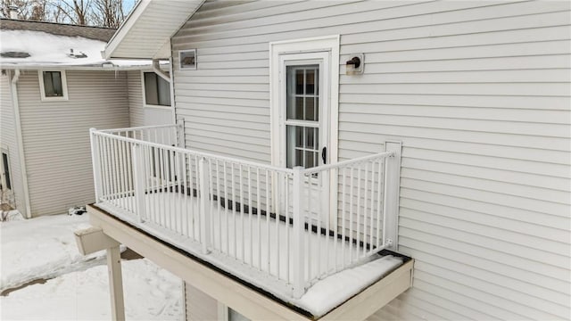 view of snow covered deck