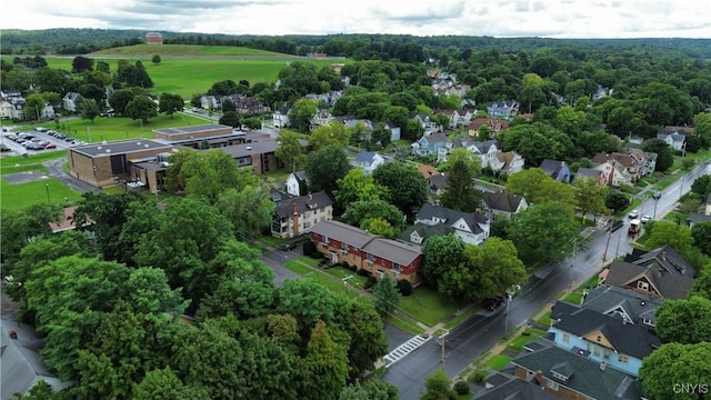 birds eye view of property with a residential view