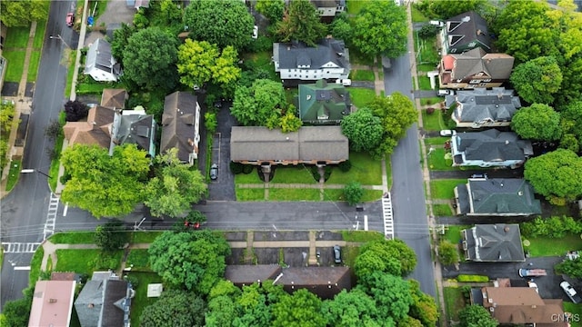 birds eye view of property with a residential view