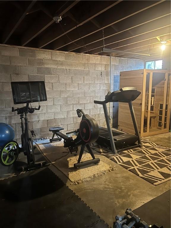 exercise area with concrete block wall