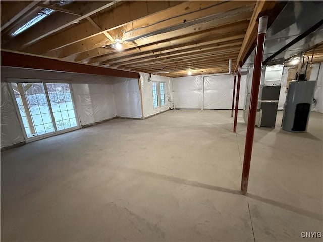 basement with heating unit and gas water heater