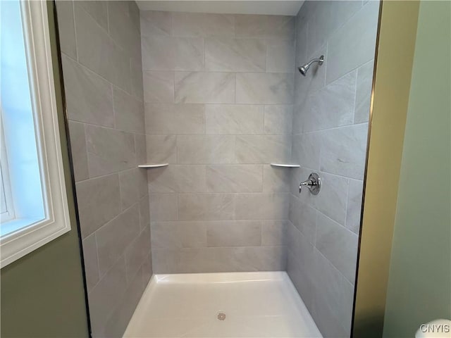 bathroom featuring a stall shower