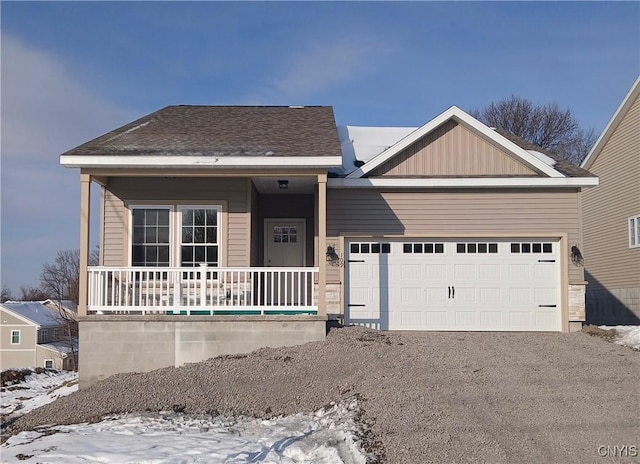 view of front of home featuring a garage, driveway, and board and batten siding