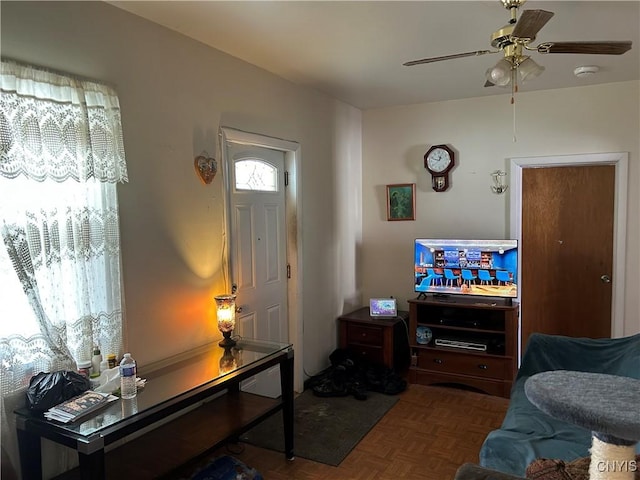 living room with ceiling fan