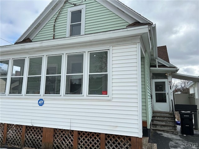 view of home's exterior with entry steps