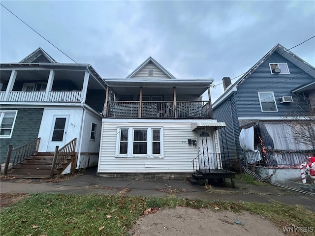 multi unit property featuring entry steps and a balcony