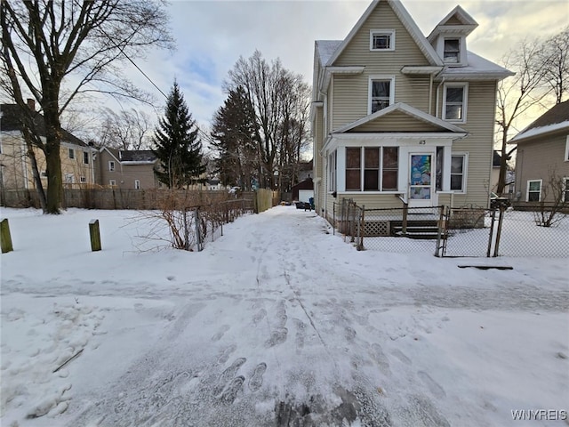 view of front of home with fence