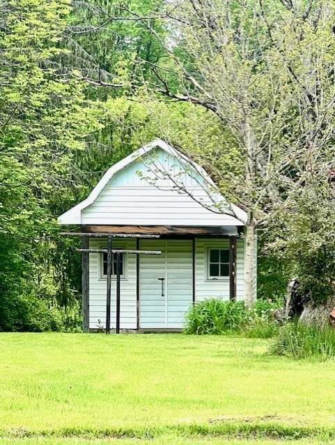 246 S Marvin St, Smethport-Borough, PA 16749 - view of outbuilding featuring a forest view