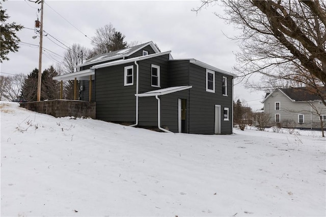 view of snow covered property