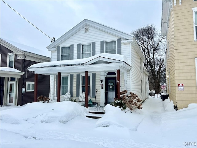 view of front of home featuring covered porch