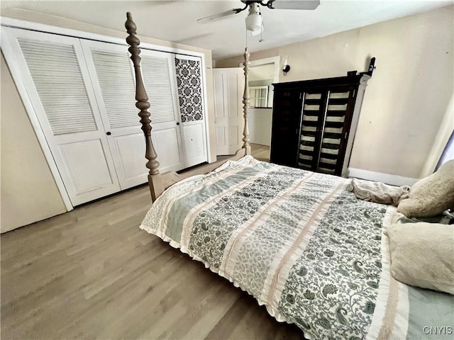 bedroom featuring light wood-style flooring and ceiling fan