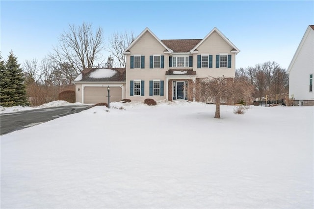 traditional home with an attached garage