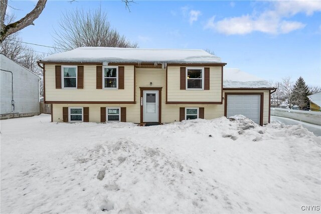 bi-level home with an attached garage