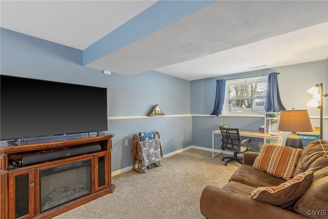 living room featuring light colored carpet and baseboards