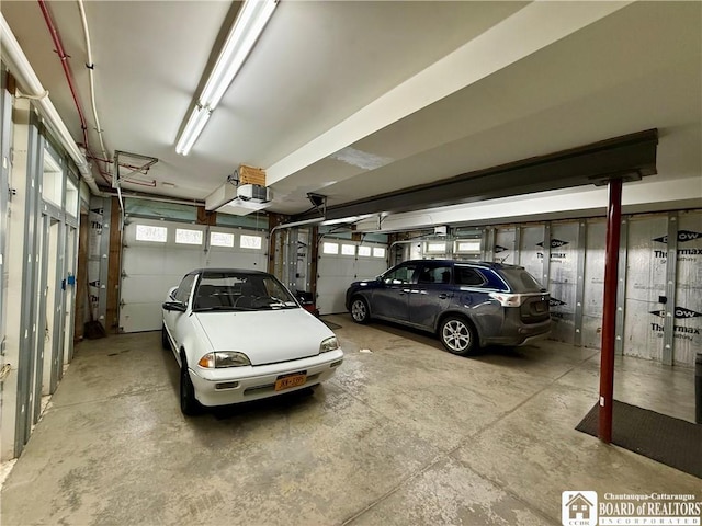 garage featuring a garage door opener