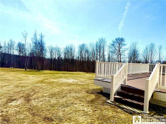 view of yard featuring a wooden deck