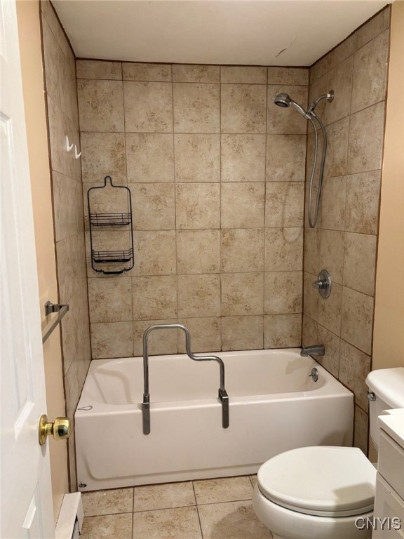 bathroom with shower / washtub combination, vanity, toilet, and tile patterned floors