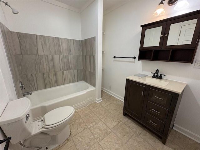 bathroom with toilet, vanity, baseboards, and shower / bathing tub combination