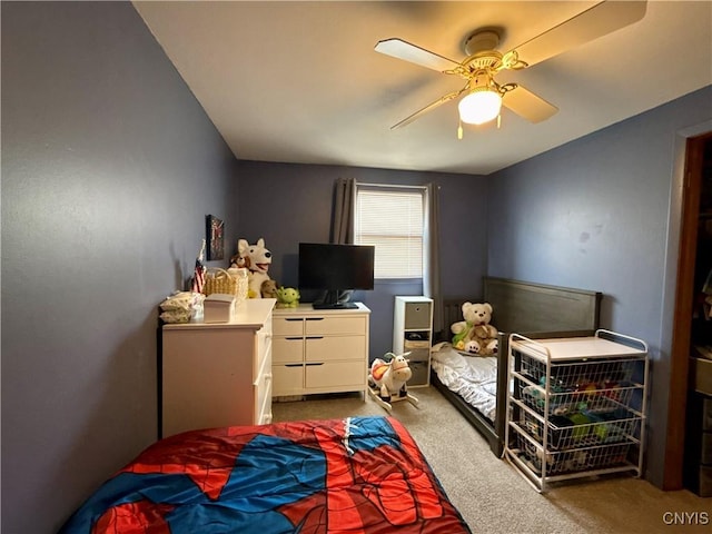 bedroom featuring a ceiling fan and carpet flooring