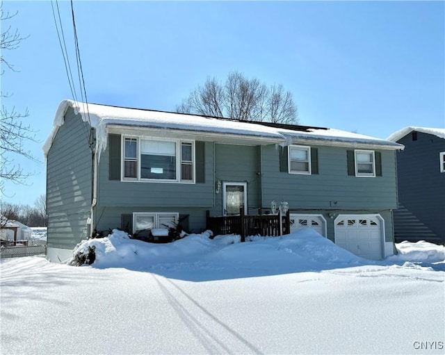 split foyer home featuring an attached garage