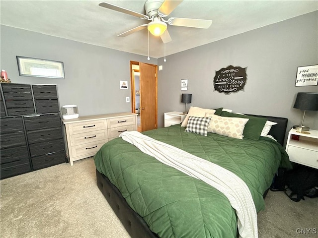 bedroom with light colored carpet and ceiling fan