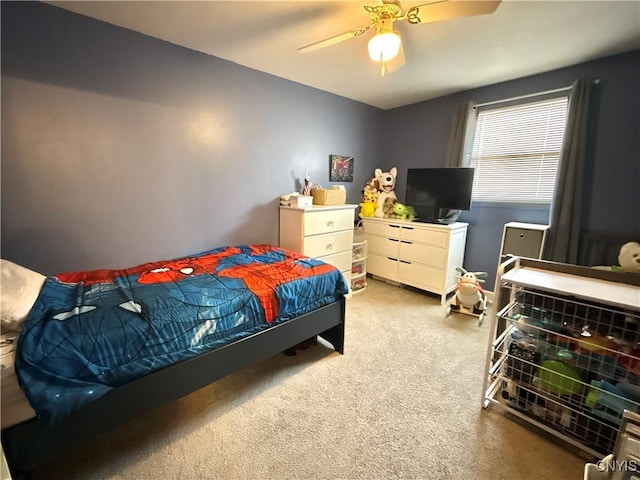 bedroom featuring a ceiling fan and carpet flooring