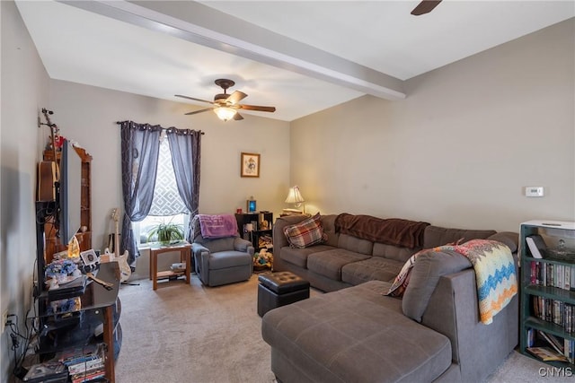 living room featuring ceiling fan, light carpet, and beam ceiling