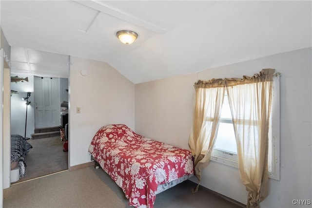 bedroom with vaulted ceiling and carpet