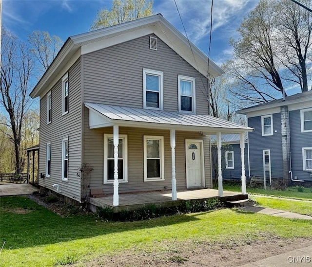 213 Salisbury St, Sandy Creek, NY 13145 - view of front of property with a standing seam roof, a porch, metal roof, and a front yard