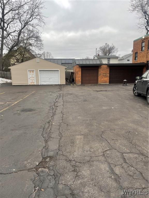 garage featuring fence