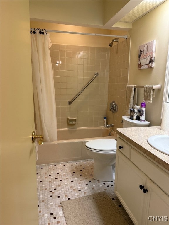 bathroom featuring shower / bath combo, vanity, toilet, and tile patterned floors