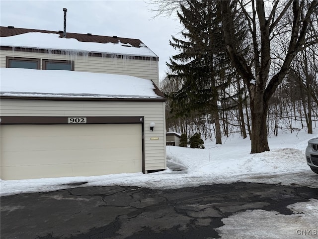 view of snow covered garage