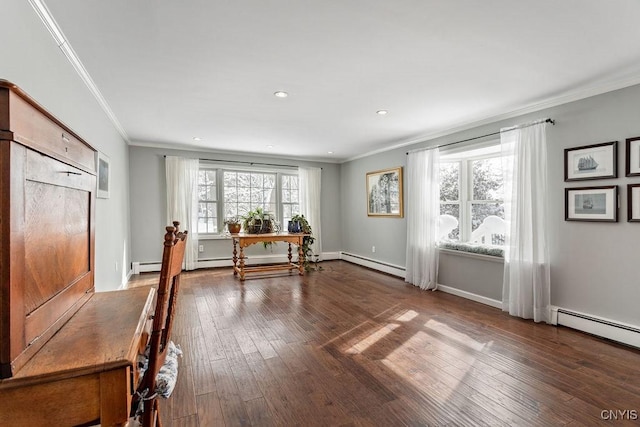 unfurnished office with a baseboard radiator, recessed lighting, dark wood-type flooring, ornamental molding, and baseboards