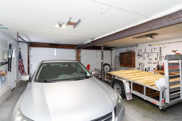 garage with a workshop area