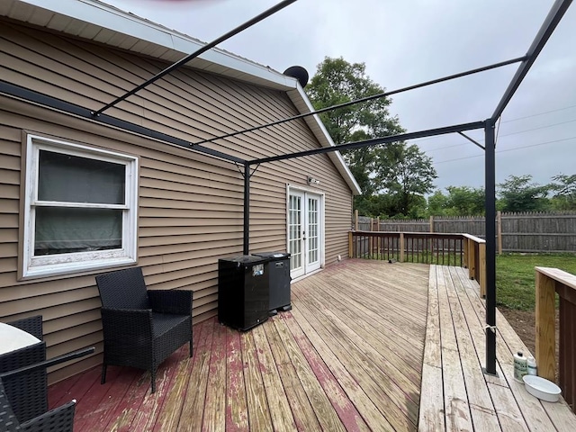 wooden deck with french doors and fence