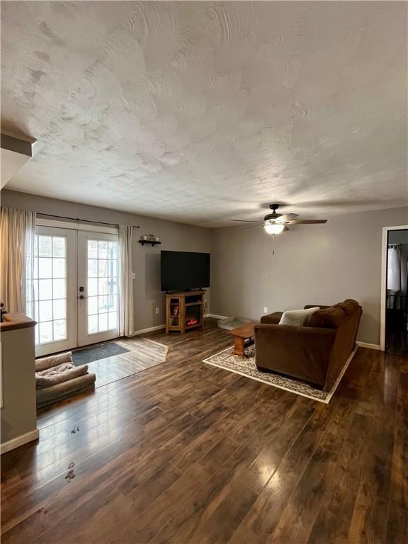 493 Prospect Hill Rd, Catlin, NY 14845 - living room featuring ceiling fan, wood finished floors, french doors, and a textured ceiling