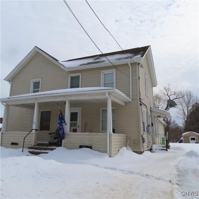 view of front of home featuring covered porch