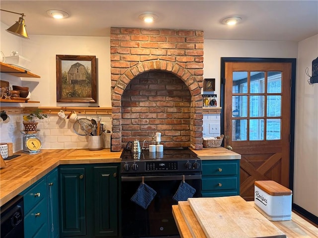 kitchen with black appliances, butcher block countertops, blue cabinets, and tasteful backsplash