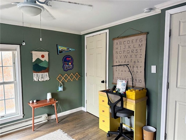 office featuring plenty of natural light, baseboards, dark wood-style flooring, crown molding, and a baseboard heating unit