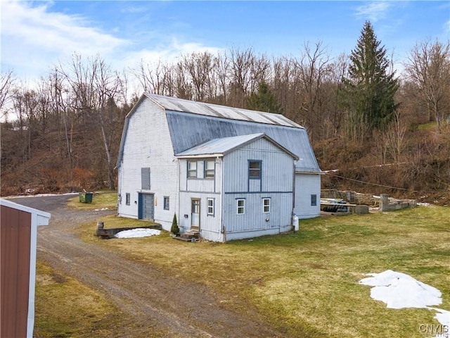 3391 State Route 28, Herkimer, NY 13350 - view of front of house with a front yard, metal roof, driveway, and a gambrel roof